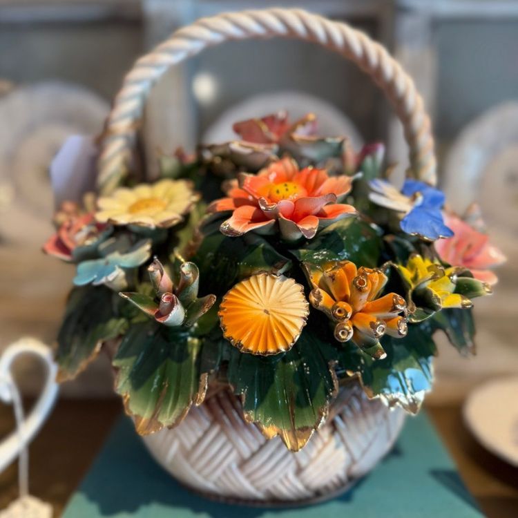 Vintage ceramic flower basket with colorful dimensional flowers, one of the distinctive vintage decorative pieces found at Reclaimed Rose in Dahlonega.